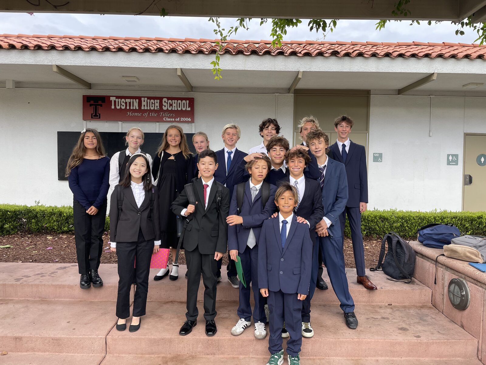 The Thurston delegation at Tustin MUN 2025, in front of the Tustin High School sign